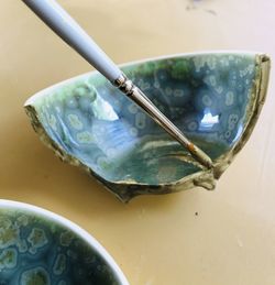 High angle view of water in bowl on table