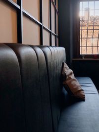 Man sitting on sofa at home