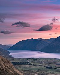 Scenic view of mountains at sunset