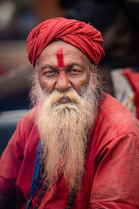 Portrait of man wearing red outdoors