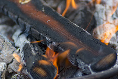 Close-up of firewood on barbecue