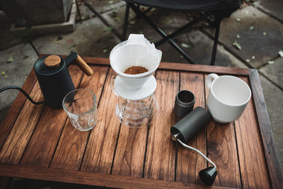 Barista dripping coffee and slow coffee bar style