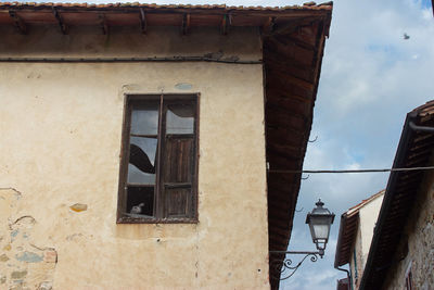 Low angle view of old building against sky