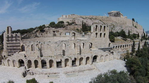 Abandoned amphitheater against blue sky