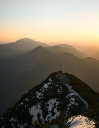 Silhouette mountain against clear sky during sunset