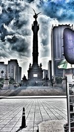 Statue of liberty against cloudy sky