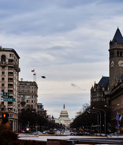 Buildings in city against sky