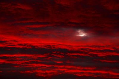 Low angle view of dramatic sky at sunset