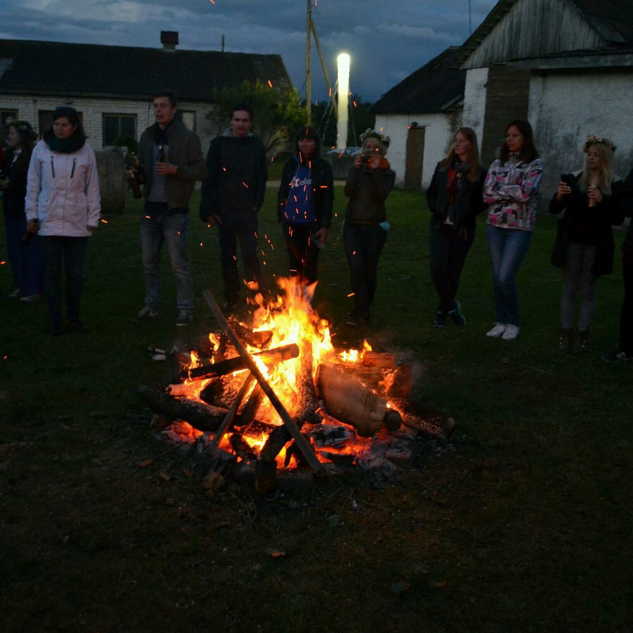 burning, flame, large group of people, heat - temperature, fire - natural phenomenon, men, lifestyles, leisure activity, person, bonfire, fire, night, illuminated, glowing, celebration, motion, togetherness, enjoyment, medium group of people