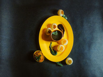 High angle view of orange juice on table