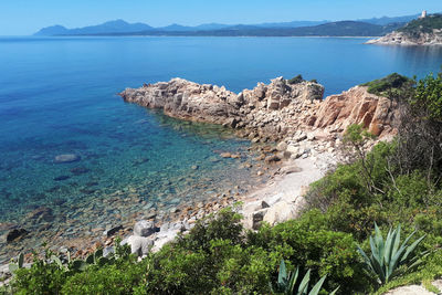 Scenic view of bay against clear sky