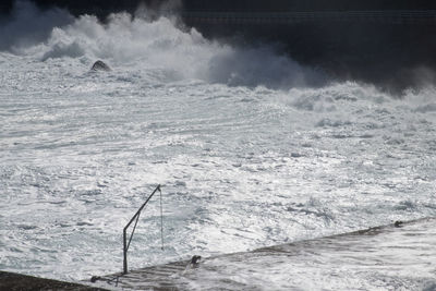 View of waves splashing on sea