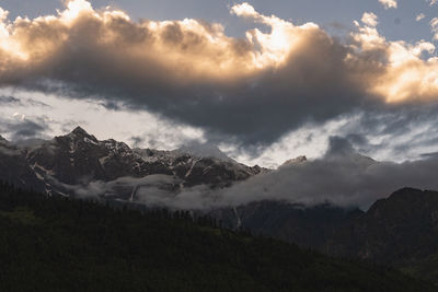 Scenic view of mountains against sky during sunset