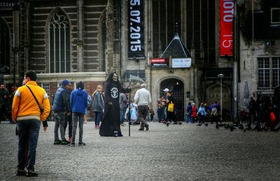 Woman standing in city