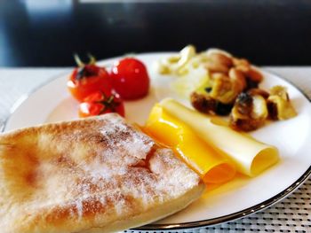 Close-up of breakfast served on table