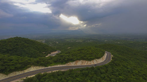 High angle view of road amidst landscape against sky