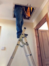 Low section of man working at home