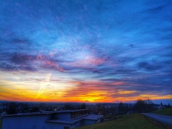 Scenic view of dramatic sky at sunset