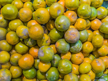 Full frame shot of oranges in market