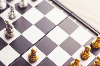 Close-up of chess pieces on board