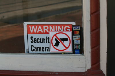Close-up of warning sign on wall
