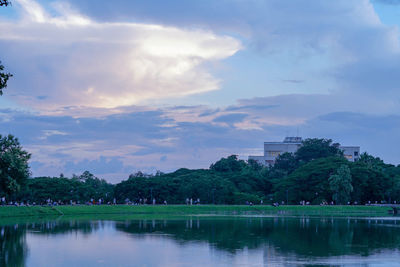 Scenic view of lake against sky during sunset