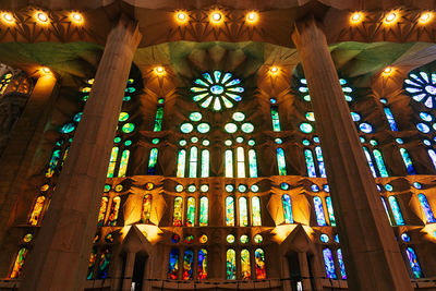 Low angle view of illuminated ceiling of building