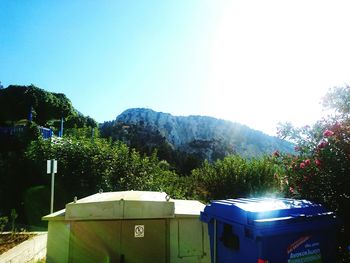 Built structure in front of mountains on sunny day