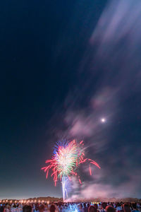 Firework display at night