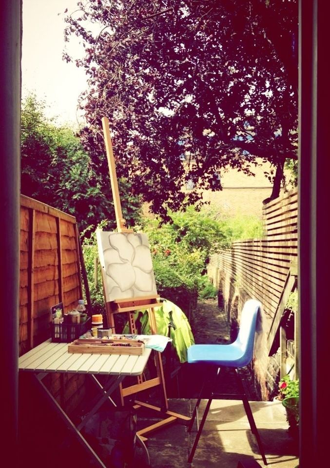 chair, tree, window, indoors, table, house, built structure, potted plant, absence, architecture, building exterior, empty, seat, day, growth, bench, home interior, plant, relaxation, furniture