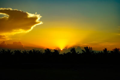 Scenic view of silhouette landscape against sky during sunset