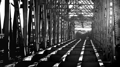 Black and white image of an old bridge being taken down in spottsville, ky 