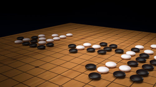High angle view of balls on table against black background