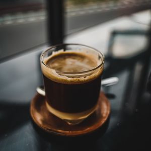 Close-up of coffee cup on table