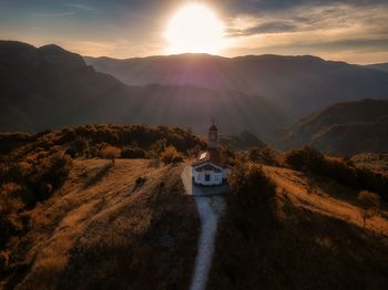 Scenic view of mountains against sky during sunset