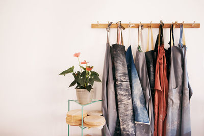 Close-up of clothes hanging on rack