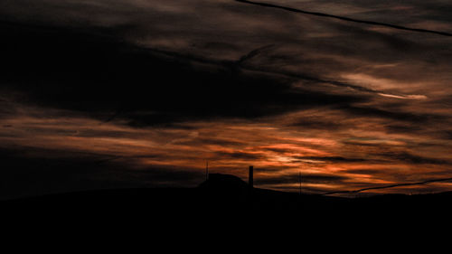 Low angle view of dramatic sky during sunset