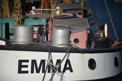 Close-up of ship moored in water