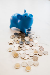 Close-up of coins on white background