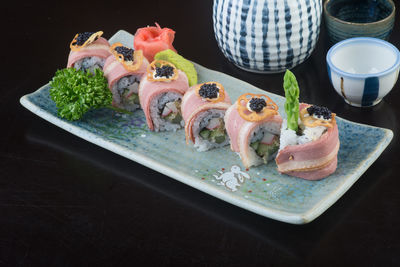 Close-up of sushi served on table