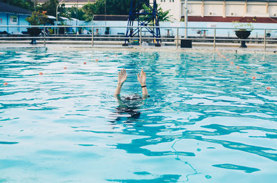 High angle view of swimming in pool