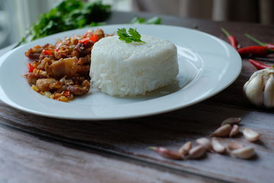 Close-up of food in plate on table