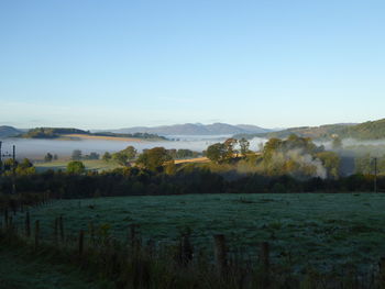 Scenic view of lake against clear sky