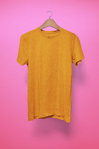 Built structure hanging against pink background