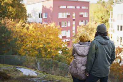 Happy couple in autumn scenery