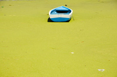 Car on yellow boat