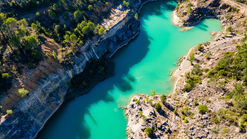 High angle view of rocks in sea