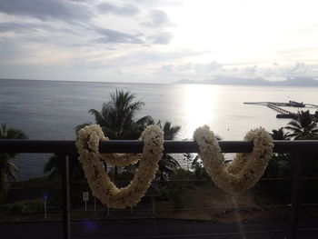 Scenic view of sea against cloudy sky