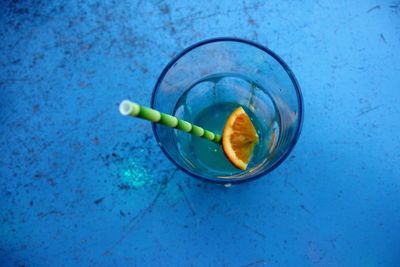 High angle view of drink on blue glass