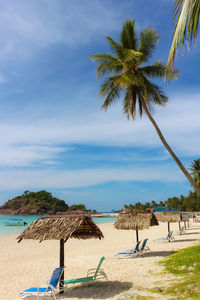 Scenic view of beach against sky